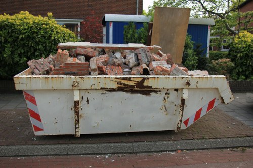 Camberley waste collection truck in action