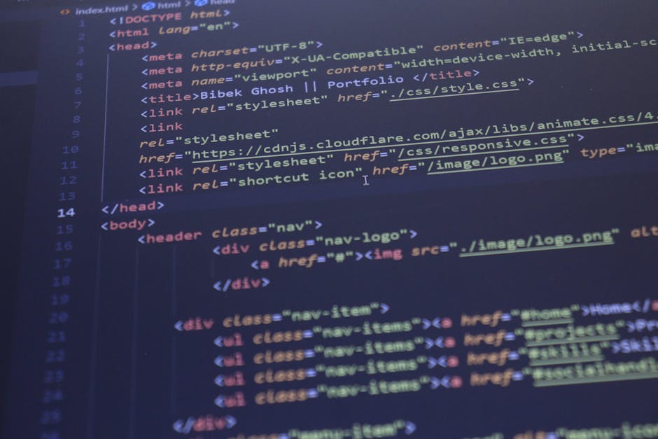 A close-up view of a computer screen displaying lines of HTML and CSS code in various colors, including yellow, blue, red, and green, on a dark background. The code includes tags for headings, image a